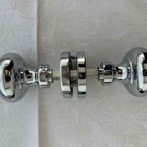 Door knobs used, 9 sets, chrome ball type with rosette