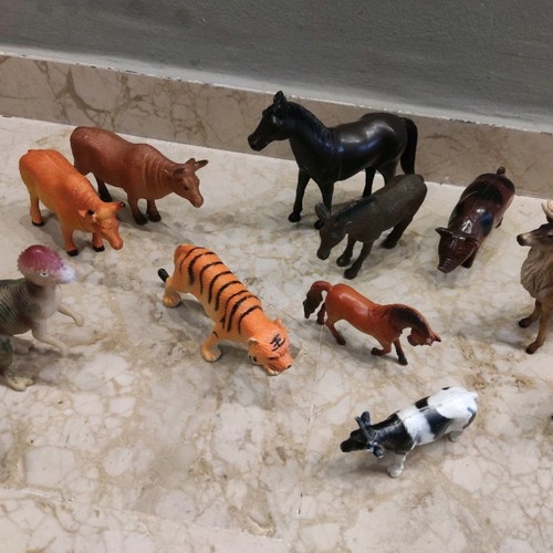 Plastic animals used, pack of 12 with dinosaurs