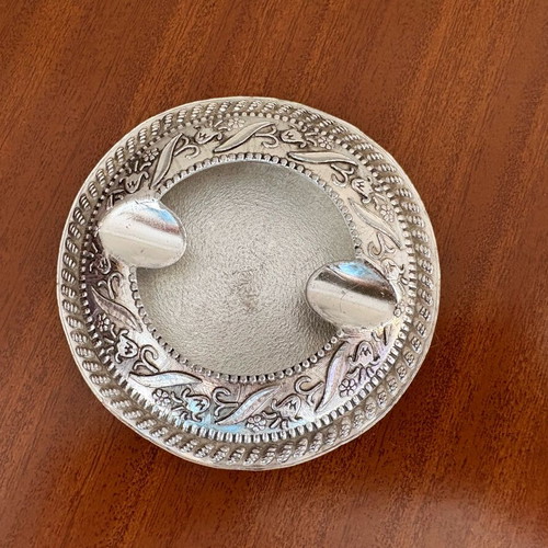 Vintage metal ashtray used with floral embossed details, 1970s