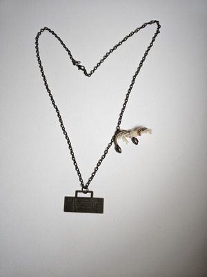Vintage necklace with cassette player pendant and headphones used