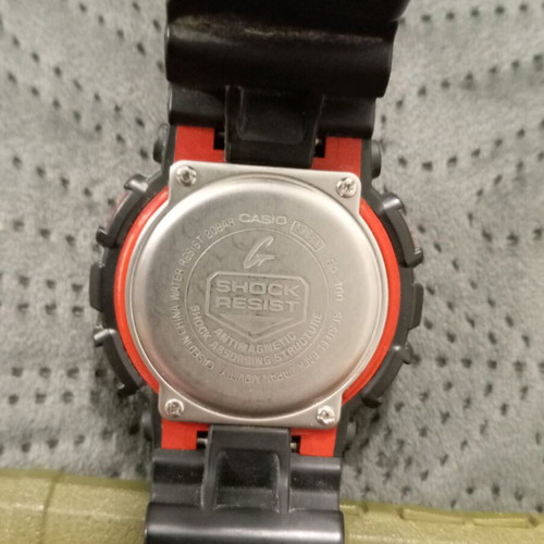 Casio Gshock GA100 watch used, black and red