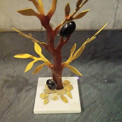 Olive tree like new made of metal and stone
