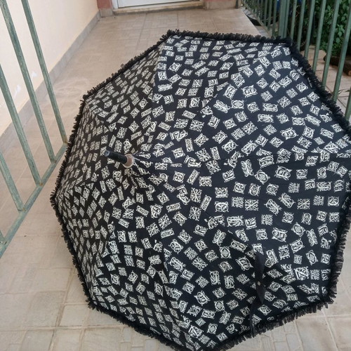 Chantai Thomass umbrella used with frills from France