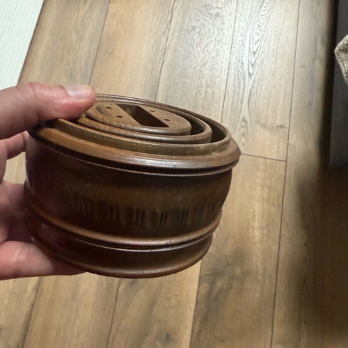 Wooden stand used, likely for night lamp