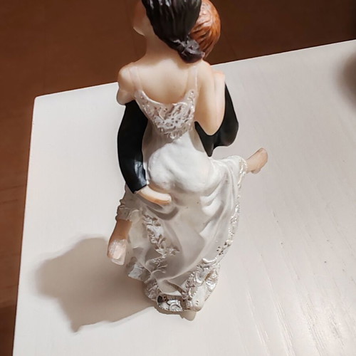Decorative cake topper like new, 15 cm height, 6 cm length