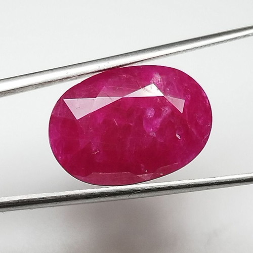 Ruby 10.54 carat hot pinkish red from Mozambique new