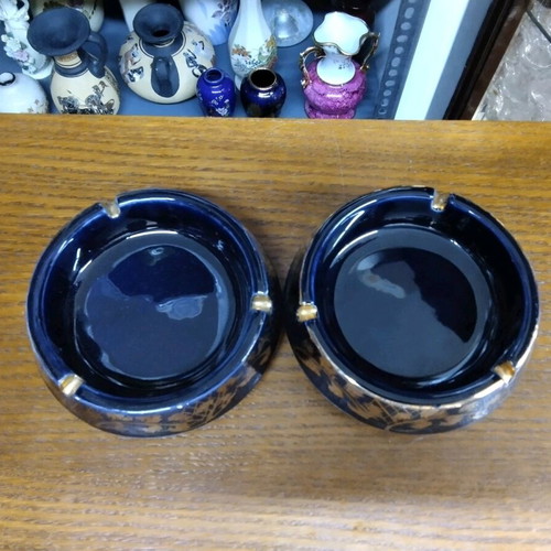 Porcelain ashtrays set like new, 2 pieces with gilded details
