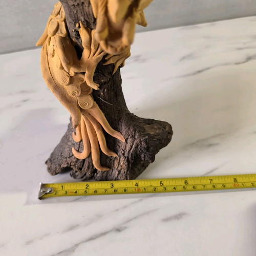 Wooden handmade dragon used with wooden base