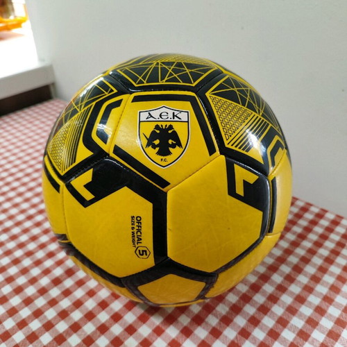 AEK Striker soccer ball like new, yellow-black, size 5