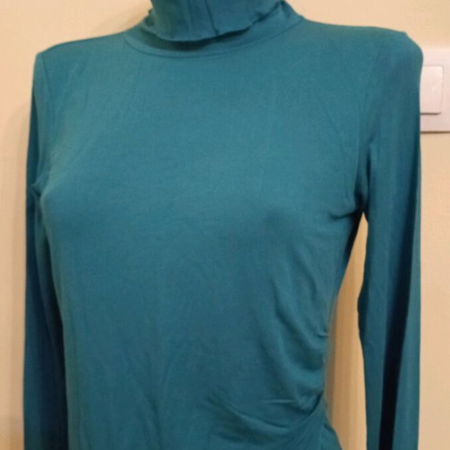 Turtleneck with open back used, size S