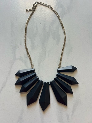 Necklace used with metal and plastic elements