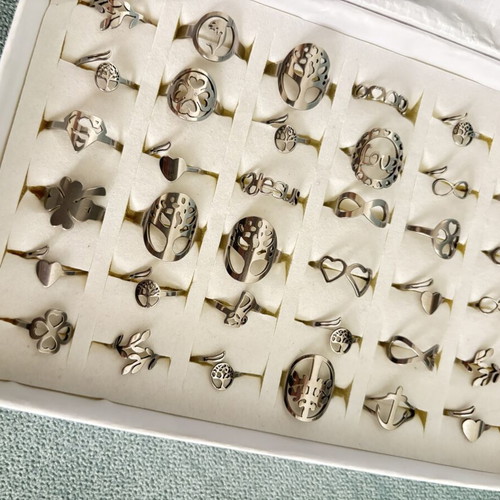 Box of 36 new steel rings with adjustable and fixed sizes