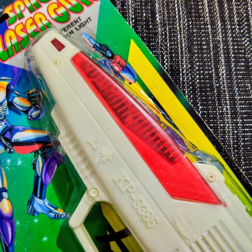 Vintage Space Laser Gun new, sealed in blister pack