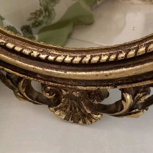 Oval bronze mirror used, antique style with gold paint