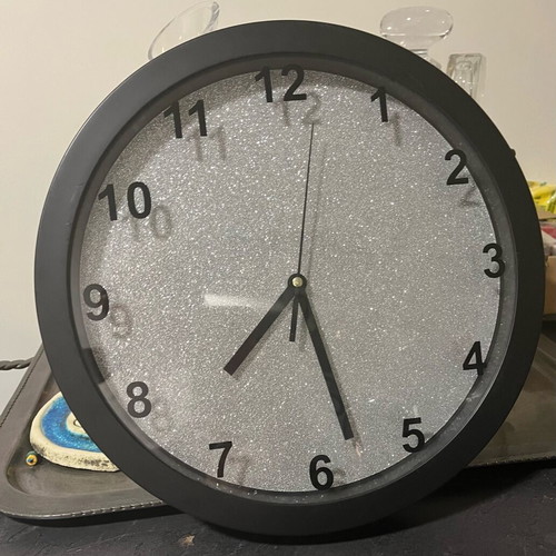Wall clock with silver glitter background like new