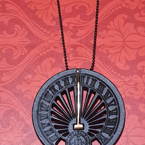 Vintage round pendant black with gold detail like new