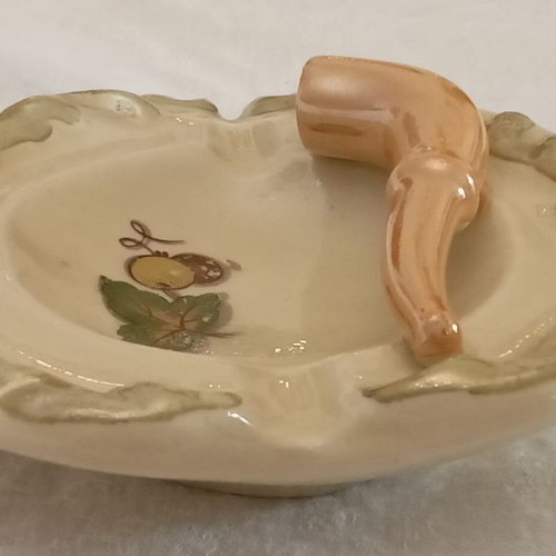 Handmade Art Deco ashtray used from the 1950s with inset pipe