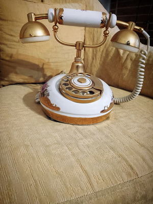 Vintage gold telephone with porcelain like new