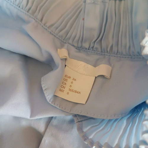 Blue shirt like new, size S with smocked waist and cuffs