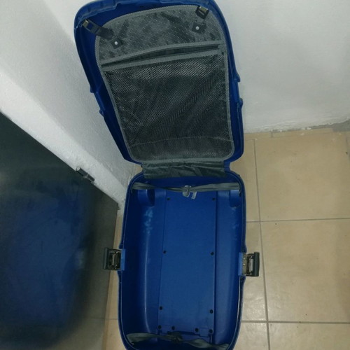 Hard plastic suitcase with lock and wheels