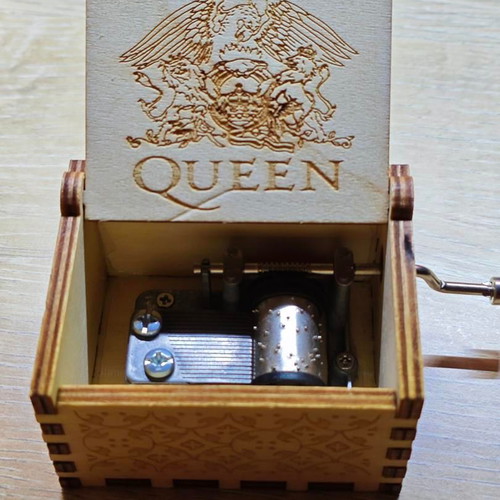 Wooden Queen Music Box like new with hand crank and engraved design