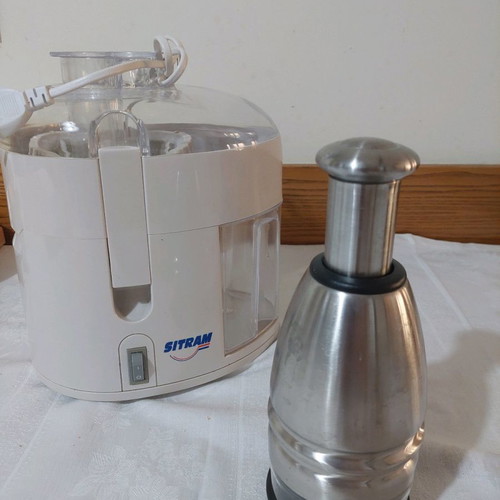 Sitram juicer and metal fruit cutter used
