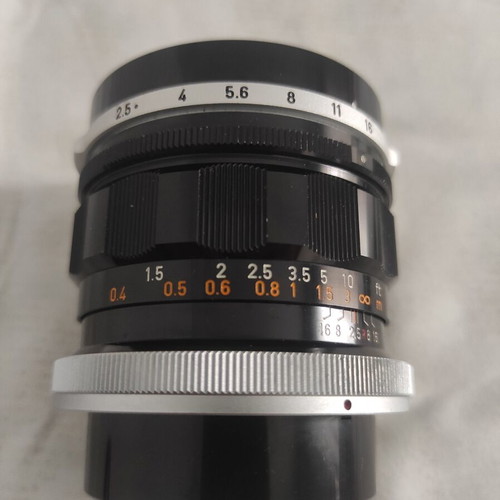 Canon FL 35mm f/2.5 wide-angle lens with HOYA 58mm 81A filter