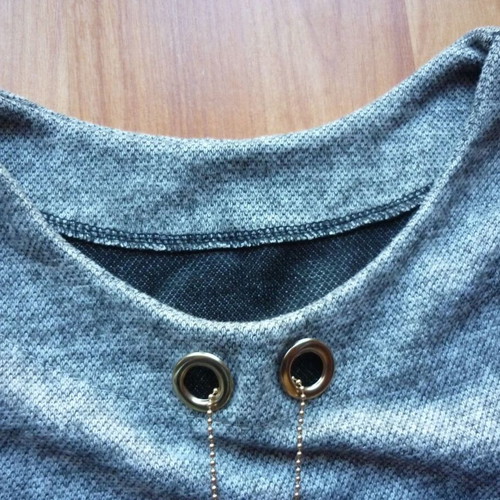 Women's blouse M/L gray like new, long back with hanging details