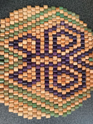 Pot holder used, wooden beads ethnic pattern 17 cm diameter