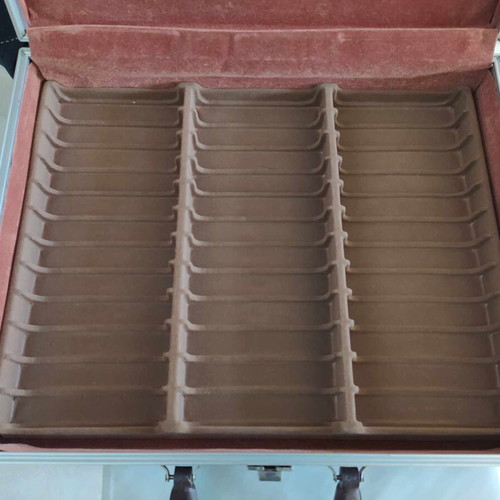 Leather cassette case used for 36 tapes with velvet interior