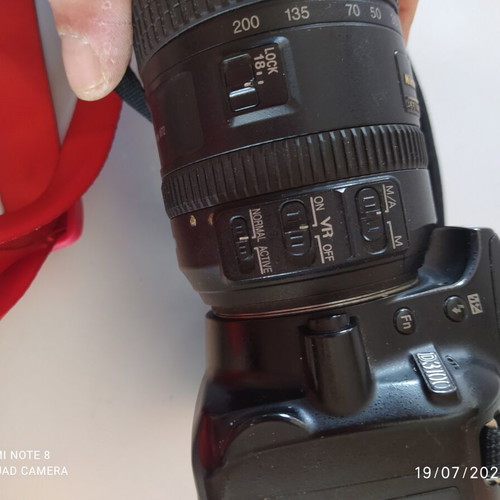 Nikon D3100 DSLR camera used with AF-S DX Nikkor 18-200mm f/3.5-5.6G ED VR lens