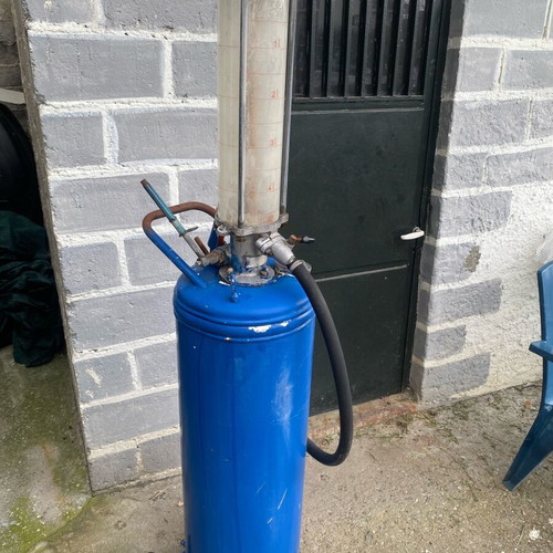 Oil and gasoline pump used with glass container
