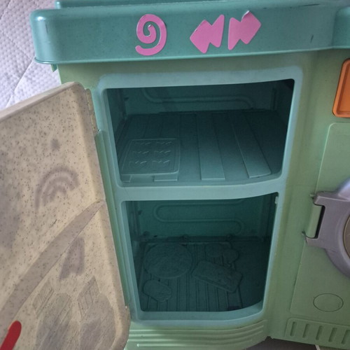 Fisher Price children's play kitchen with microwave and washing machine