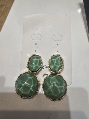 Green stone dangle earrings with water ripple effect, gold frame