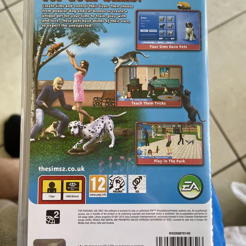 The Sims 2 Pets PSP game like new with case and manual