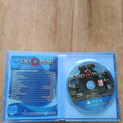 God of War PlayStation 4 game like new with booklets