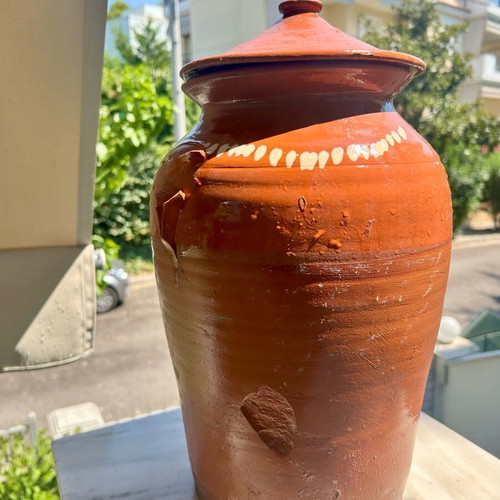 Old traditional ceramic jar used, handmade with lid