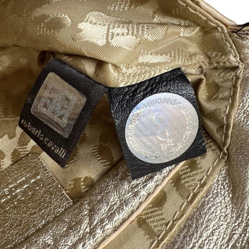 Roberto Cavalli silk clutch used with signs of wear and discoloration