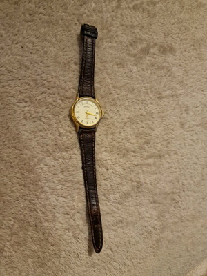America Perry Ellis wristwatch used with leather strap