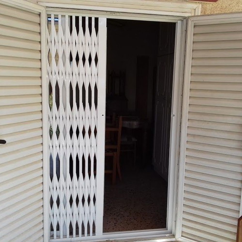 Aluminum balcony door used 116x198 with folding security grille