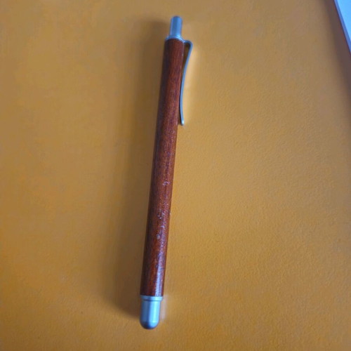 Mini NAVA pen made of wood like new, needs refill