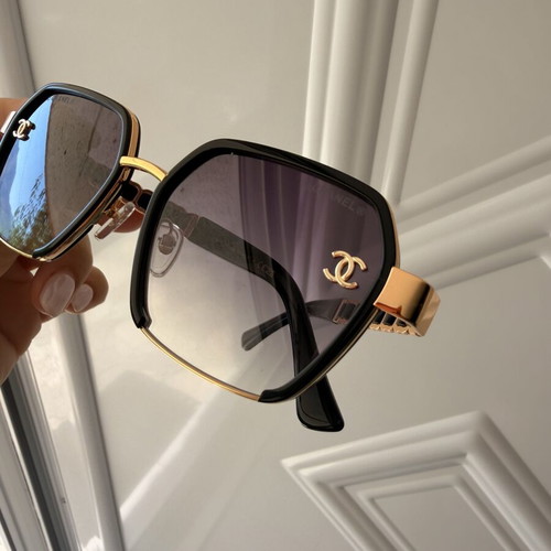 Chanel women's sunglasses black and gold, new model