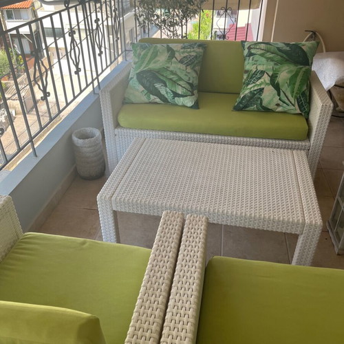 Outdoor furniture set like new with sofa, two armchairs and table