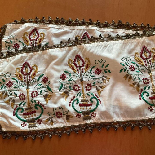 Vintage embroidered table runner with gold thread and lace