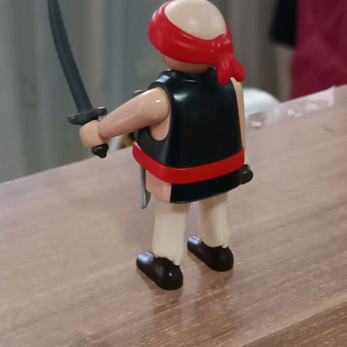 Playmobil Bald Pirate like new with weapon and sword