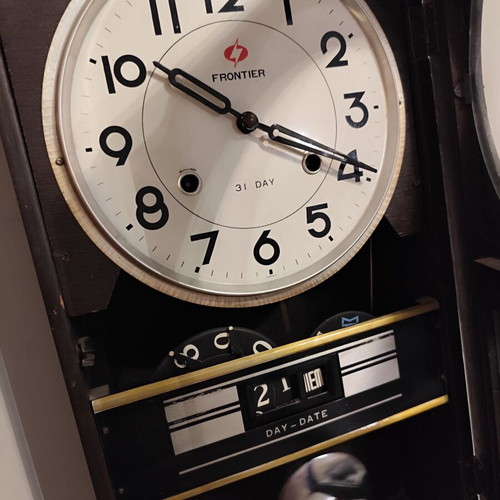 Frontier 31 Day mechanical wooden wall clock with pendulum and calendar like new