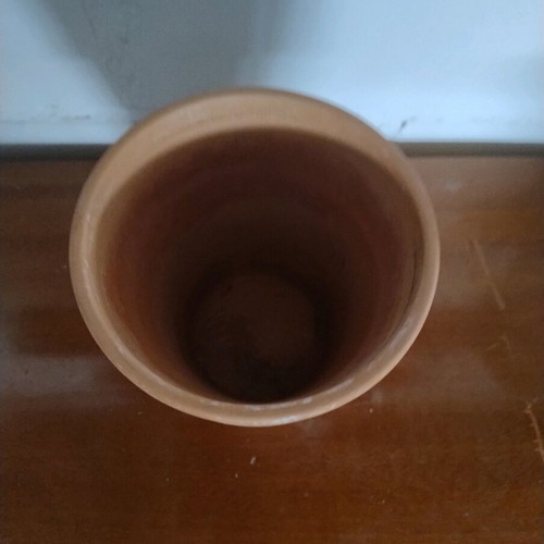 Clay flowerpot used, light brown color