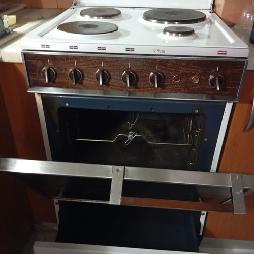 Electric oven used with spit, grill, and light