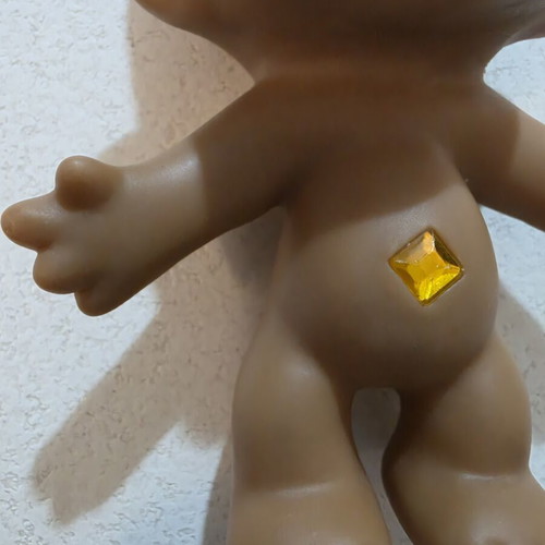 Efxoulis collectible with diamond, 1980s, used, trimmed hair