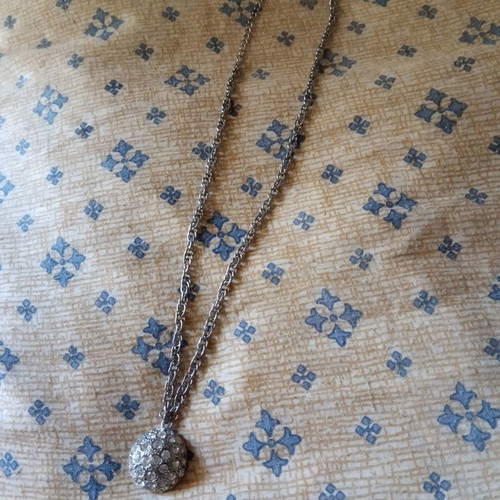 Pendant with rhinestones and long twisted chain used